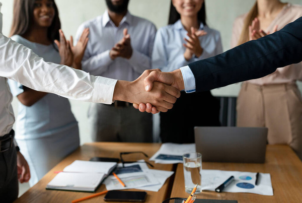 Successful Deal. Closeup Shot Of Two Man Handshaking At Group Corporate Meeting - Foto, Imagem