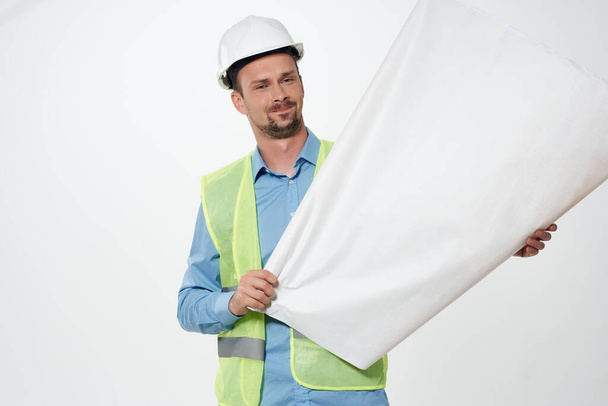 male builders blueprints builder isolated background - Foto, afbeelding