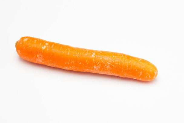 Carrot on white background. Rich in vitamins - Zdjęcie, obraz