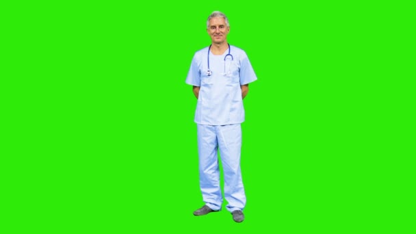 Male doctor wearing medical scrubs - Footage, Video