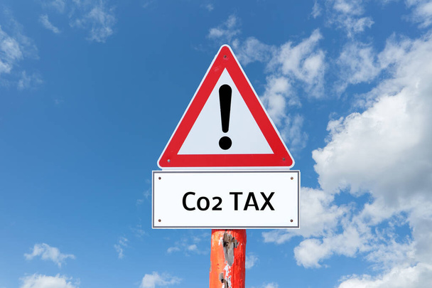 Co2 Tax Warning Sign on Blue Background - Photo, Image