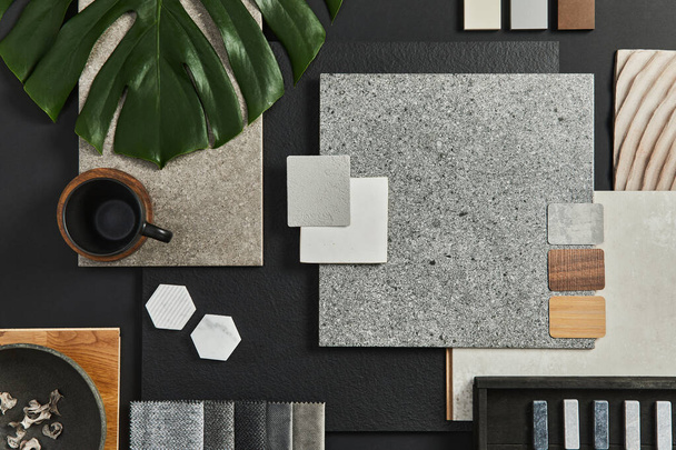 Flat lay composition of creative black architect moodboard with samples of building, textile and natural materials and personal accessories. Top view, black backgroung, template. - Foto, Imagem