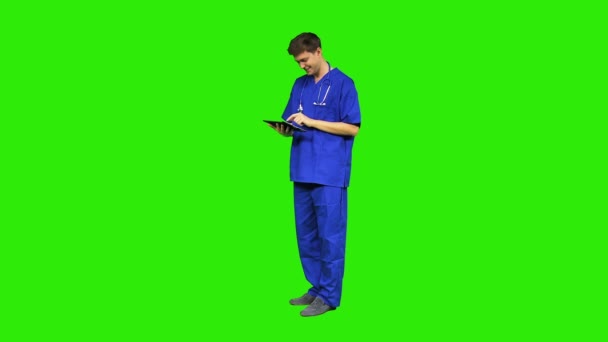 Male nursing assistant using tablet - Footage, Video