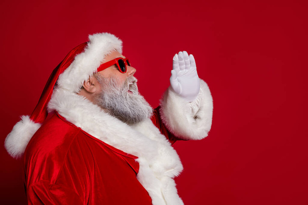 Profile photo of overweight santa look empty space wear hat eyewear coat isolated on red background - Foto, Imagen
