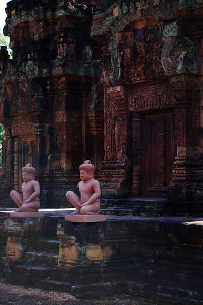 Sculpture carving ancient ruins antique building Prasat Banteay Srei or Banteay Srey temple of Angkor Wat for Cambodian people travelers travel visit respect pray at Angkor Thom in Siem Reap, Cambodia - Photo, Image