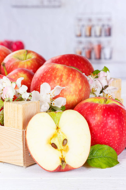 Apples fruits red apple fruit in a box with leaves portrait format and blossoms - Photo, image