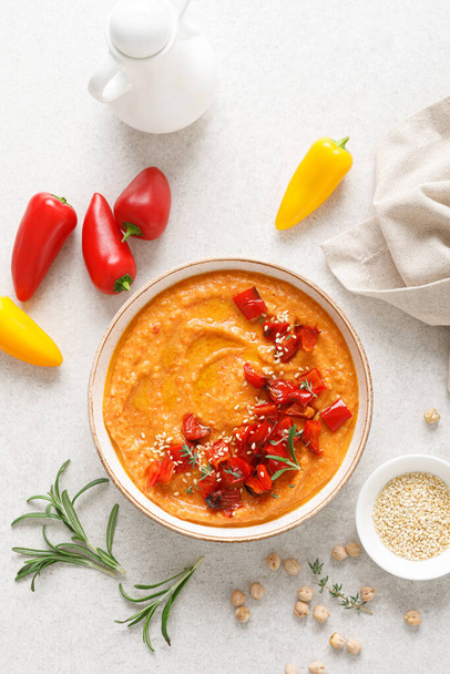 Hummus. Chickpea sauce with baked paprika. Top view. - Photo, image