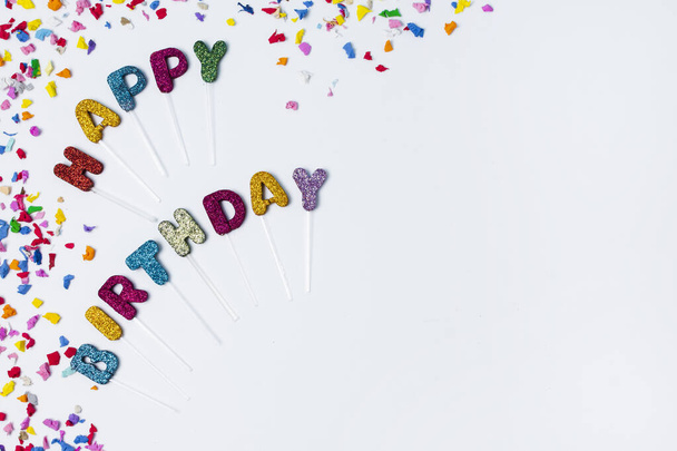 flat lay happy birthday lettering white background with copy space - Photo, Image