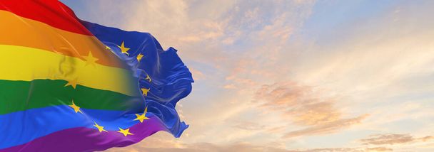 Europe lgbt pride flag waving in the wind at cloudy sky. Freedom and love concept. Pride month. activism, community and freedom Concept. Copy space. 3d illustration. - Фото, изображение
