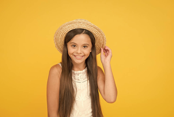 Summer travel. Vacation mood. Tropical tour. Sale and discount. Goods for kids. Adorable little girl wearing elegant hat. Have funny summer holiday. Summer tour. Leisure and entertainment concept - Photo, Image