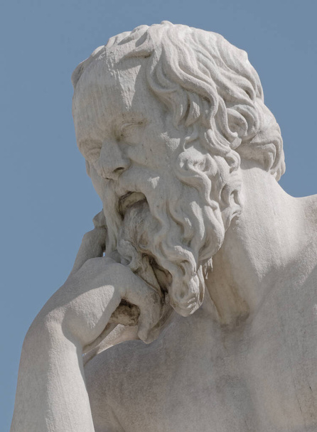 Socrates the ancient greek philosopher marble portrait isolated on blue sky background - Photo, Image
