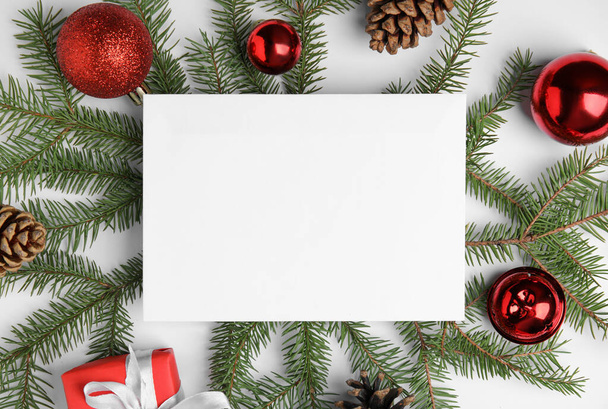 Beautiful Christmas decor and blank card on white background, flat lay - Valokuva, kuva