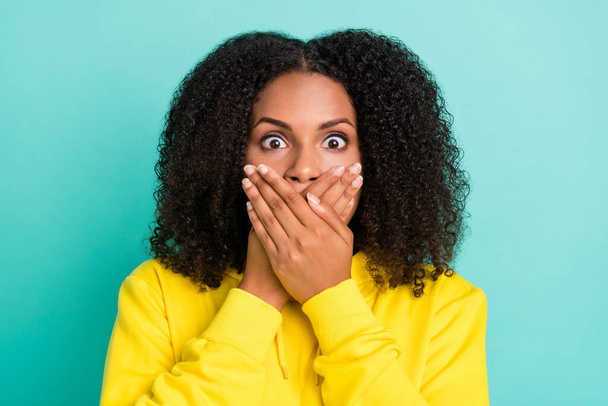 Photo portrait curly woman shut mouth keeping secret amazed isolated bright teal color background - Φωτογραφία, εικόνα