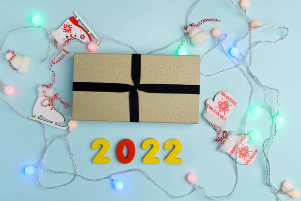 Gift box present gift, holiday, xmas, christmas 2022. shopping, sale banner, coupon concept. Blue background top view - Photo, Image