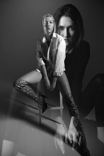 Beautiful young women, double exposure portrait. Fashion models. Black and white - Fotoğraf, Görsel