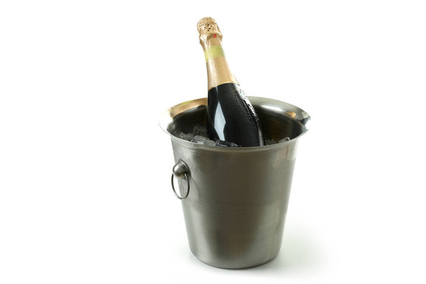 Metal bucket with ice and Champagne bottle isolated on white background. - Φωτογραφία, εικόνα