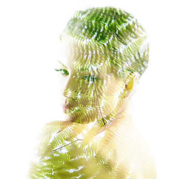 Beautiful young female face with summer fern leaves, double exposure. Beauty treatment, youth, summer and nature concept - Foto, imagen