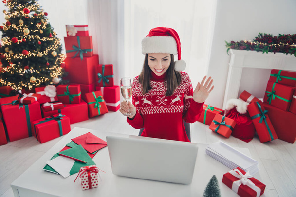 Photo of crazy funky lady sit workplace video call party congrats wear santa hat sweater in decorated x-mas home indoors - Fotoğraf, Görsel