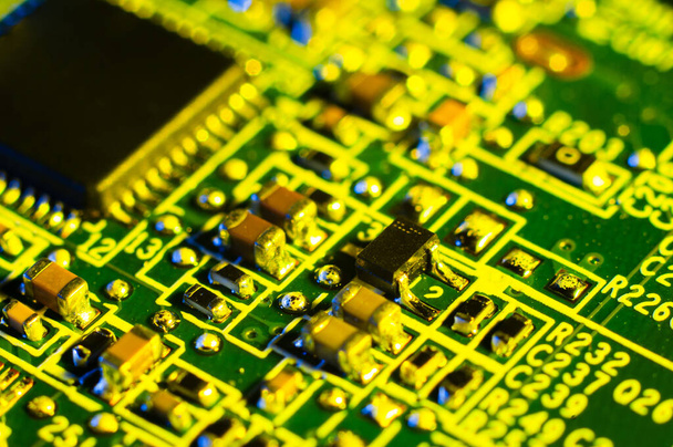 Electronic circuit board close up in macro photography - Fotoğraf, Görsel