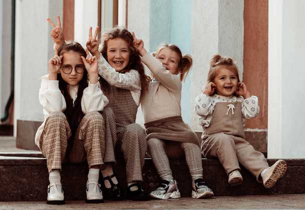 Cute little caucasian girls have fun together. Emotional lifestyle portrait. - Valokuva, kuva
