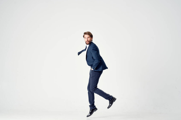 business man in a suit emotions jumping full height Victory - 写真・画像
