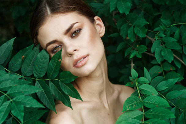 beautiful woman green leaves clean skin nature summer Lifestyle - Фото, зображення