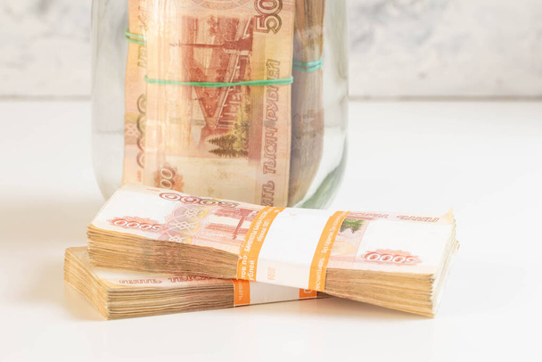 Russian money in a glass jar. - Foto, immagini