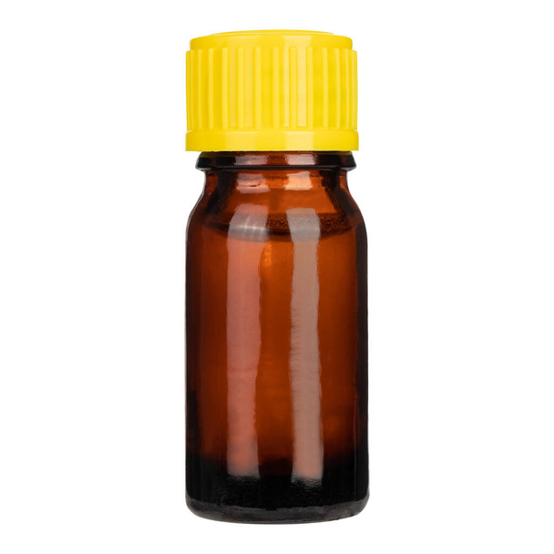 Medicine bottle of amber glass with yellow cap isolated on white background. Mock-up. - Fotó, kép