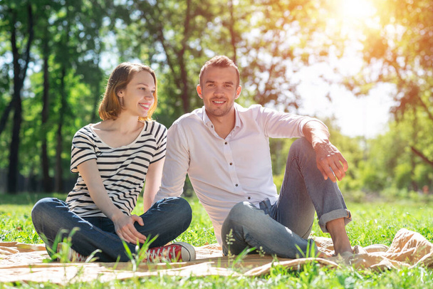 Couple on a picnic in the park - Photo, image
