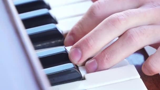 Guy playing the piano.Super close-up Shot.Macro shot finger in piano - Footage, Video