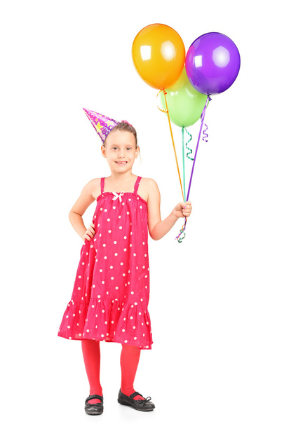 Little girl holding balloons - Zdjęcie, obraz