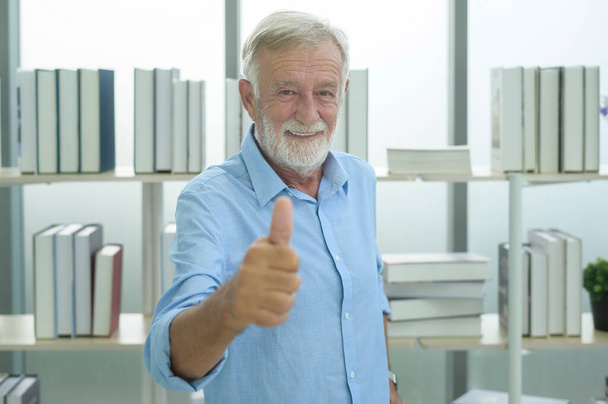A caucasian senior Businessman confident in modern office - Фото, зображення