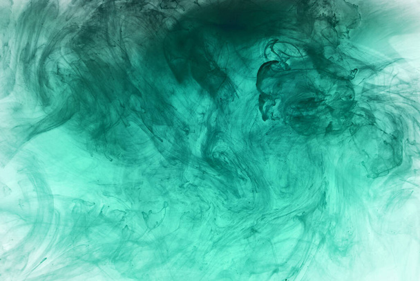 Abstract blue-green ocean, paint in water background. swirl of splashes and waves in motion. Fluid art wallpaper, liquid vibrant colors - Valokuva, kuva