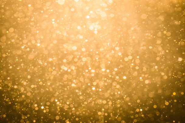 Abstraktní zlatý bokeh s černým pozadím - Fotografie, Obrázek