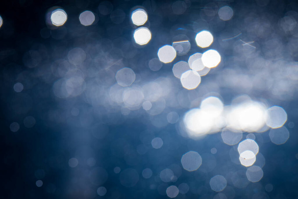 Abstract bokeh with blue background - Foto, afbeelding
