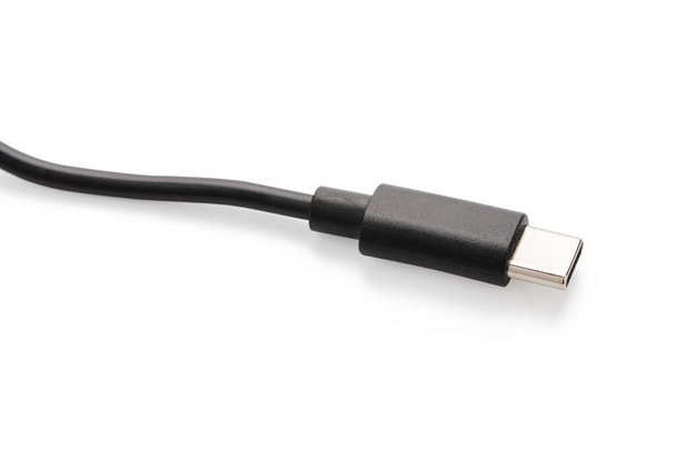 USB-C-Kabel isoliert auf weißem Hintergrund. mit Klappklopfen - Foto, Bild