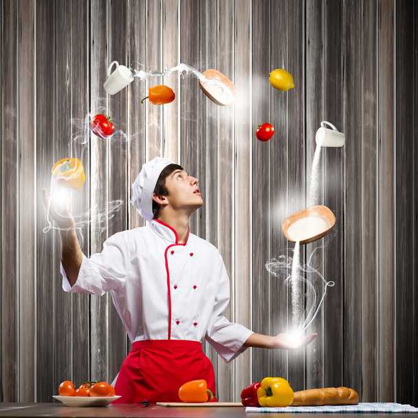 Man juggling with ingredients - Fotoğraf, Görsel