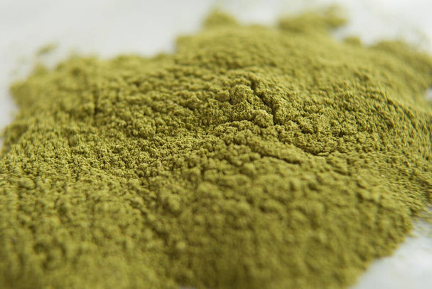 close upGrinded Moringa, Moringa powder, grinded moringa, green powder - Fotó, kép