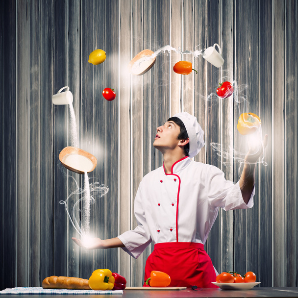 Man juggling with ingredients - Foto, imagen