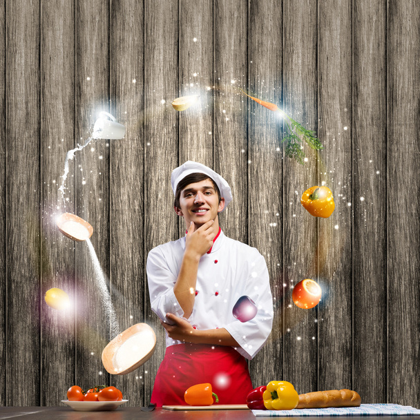 Cheerful cook and ingredients - Photo, image