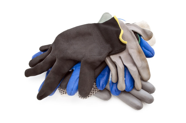 Algunos guantes de trabajo aislados
 - Foto, imagen