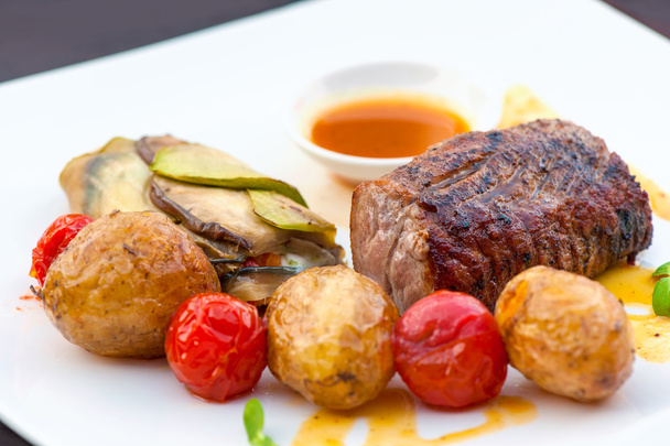 Prime grilled juicy beef steak with roasted vegetables - Photo, Image