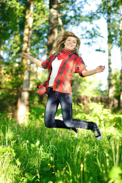 Teenager woman jumpin - Foto, imagen