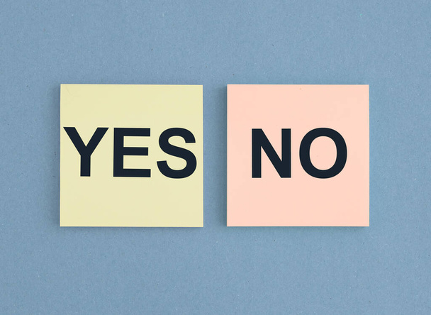 Yes and No signs on sticky notes. Choice concept - Фото, изображение