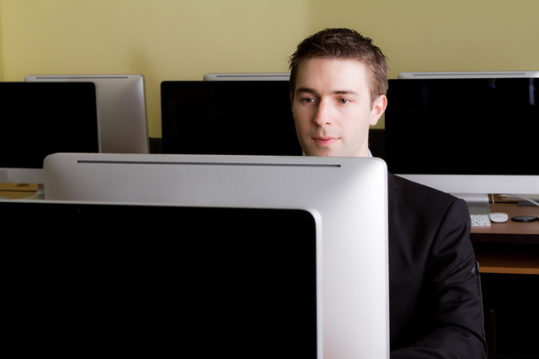 Business man at workplaces in computer room - Photo, Image