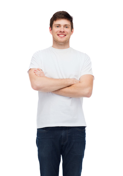 smiling young man in blank white t-shirt - Photo, Image