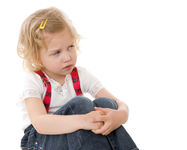 Sad little blond girl in red suspenders - Фото, зображення