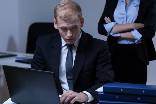 Scared male worker in the office - Fotografie, Obrázek