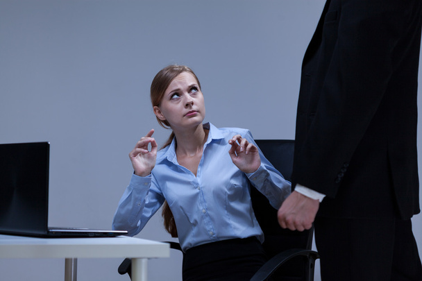Woman is afraid of her boss - Foto, Bild