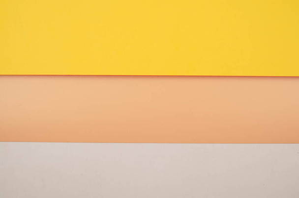 colorful yellow coral and white bright blank paper backdrop with space for your text - Photo, image